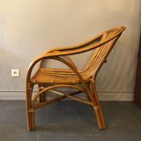 Duo of rattan armchairs with cushions