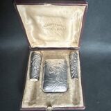 Art nouveau, silver metal smoking objects in case circa 1900