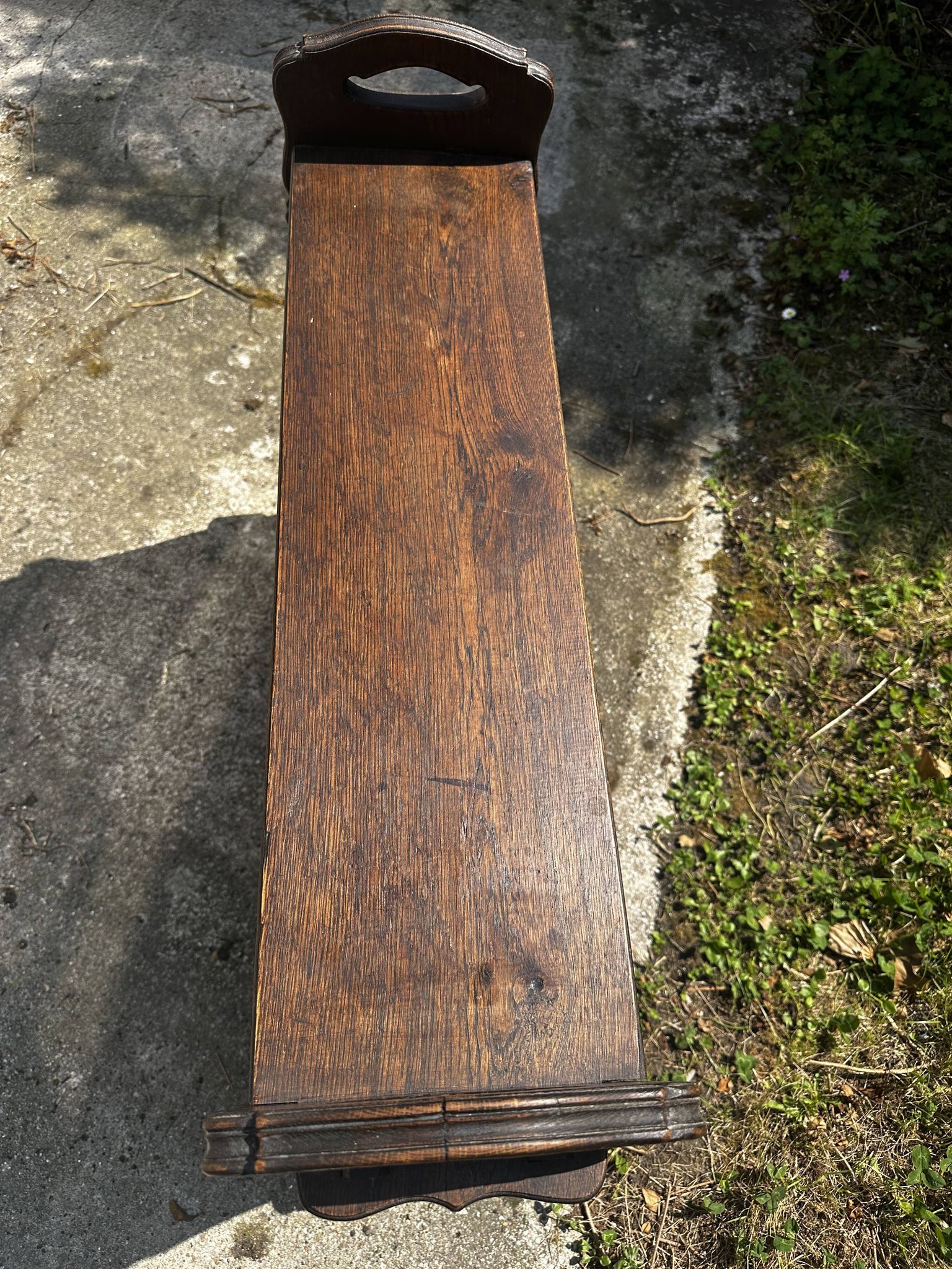 Small magazine rack / accent furniture in dark oak, late 19th century.