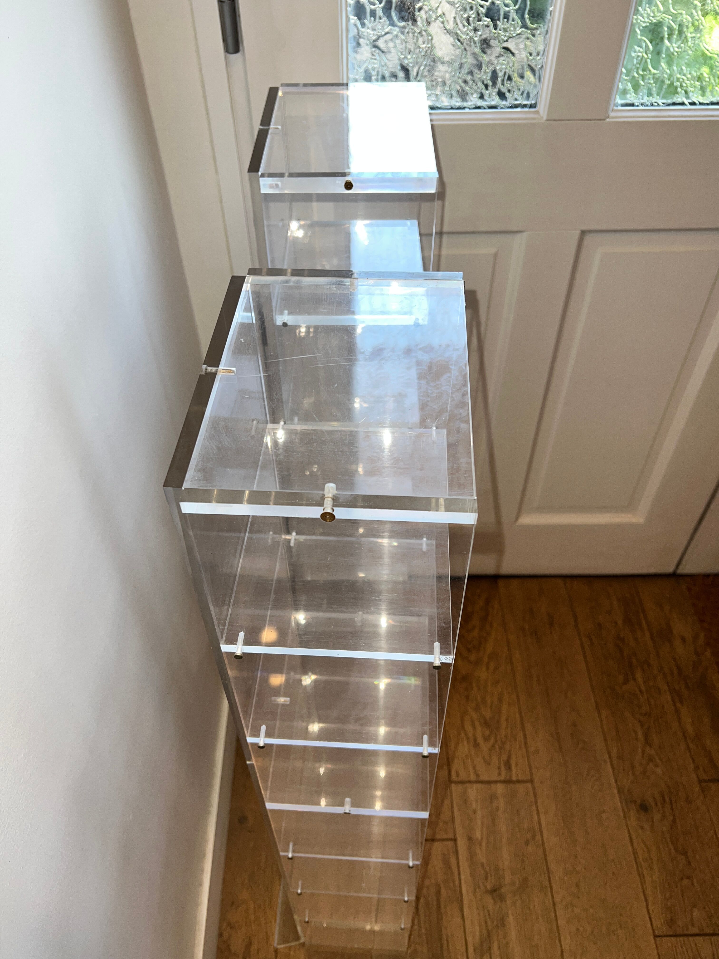 Invisible Plexiglass Shelves by Marais