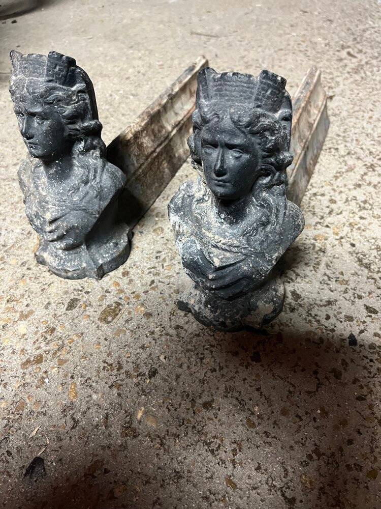 Pair of cast iron fire dogs from the 19th century