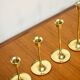 Set of 7 Scandinavian brass candle holders, 1960's