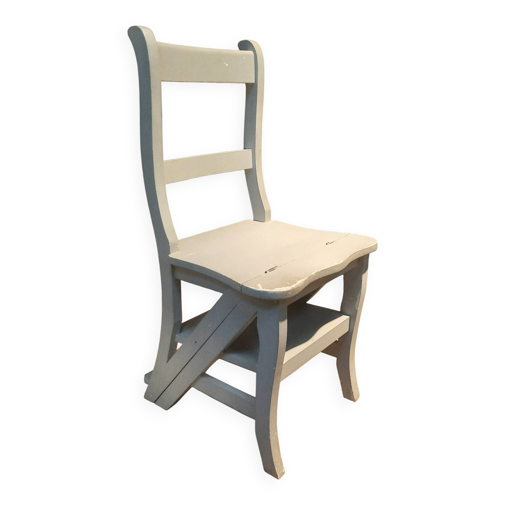 White chair convertible into a staircase.