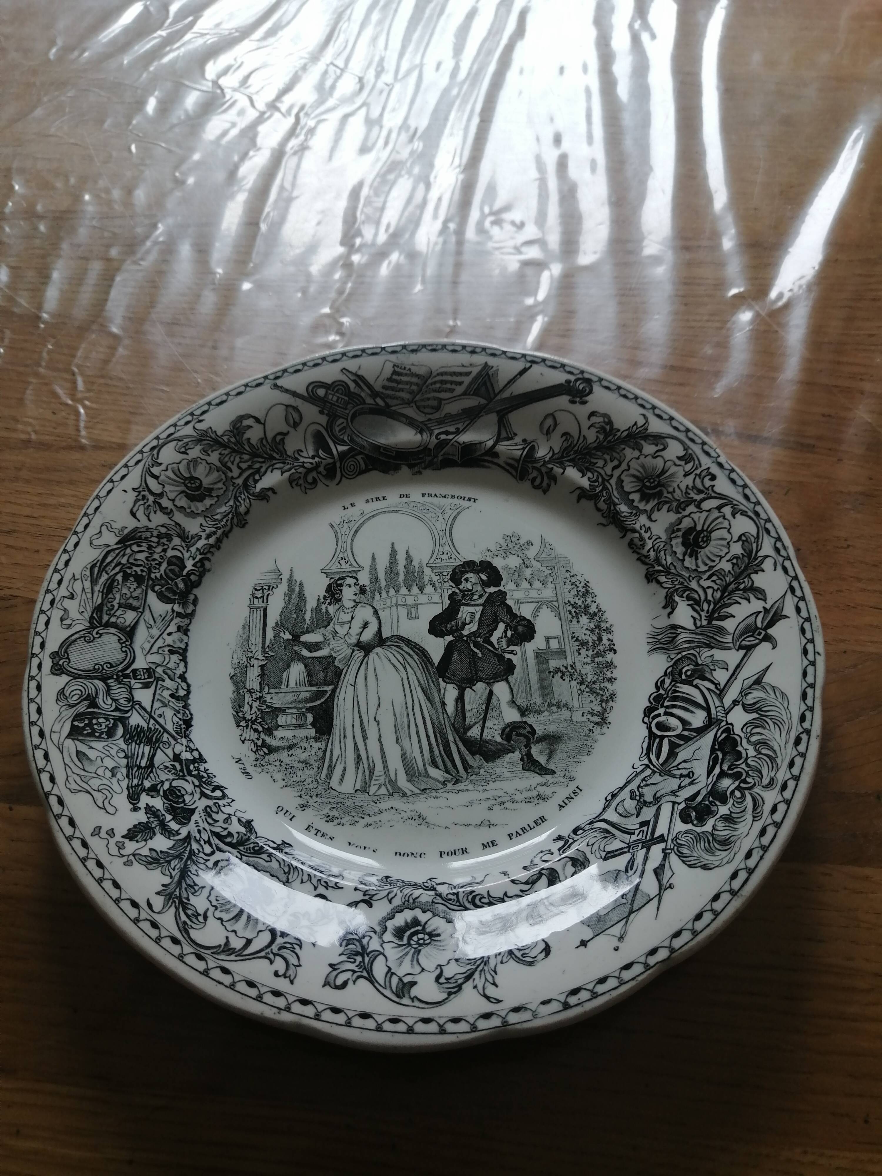 Set of eight talking plates