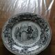 Set of eight talking plates
