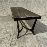 Coffee table with stone top and iron legs