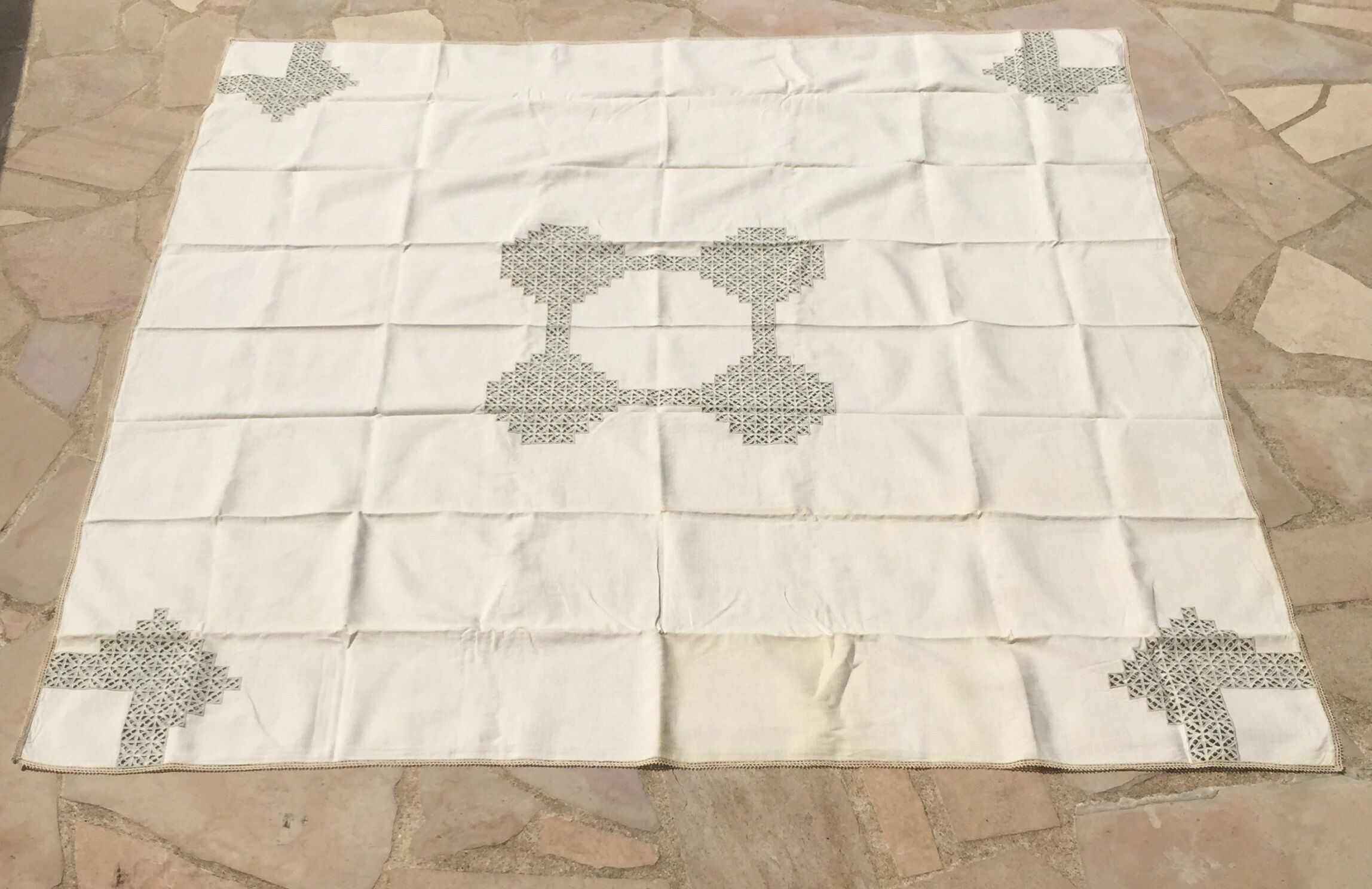 Old embroidered cotton tablecloth