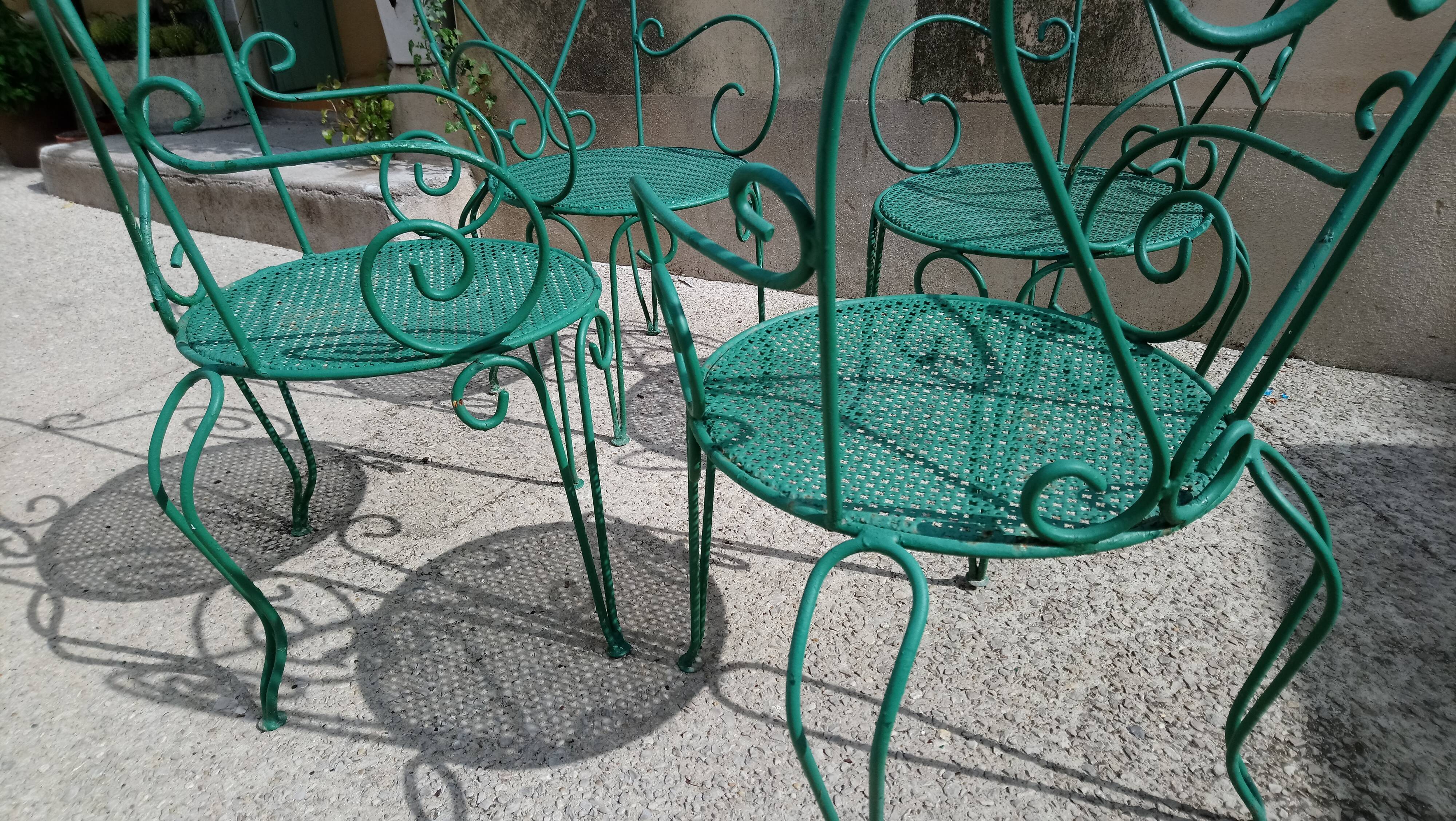 Suite de 4 fauteuils de jardin années 60