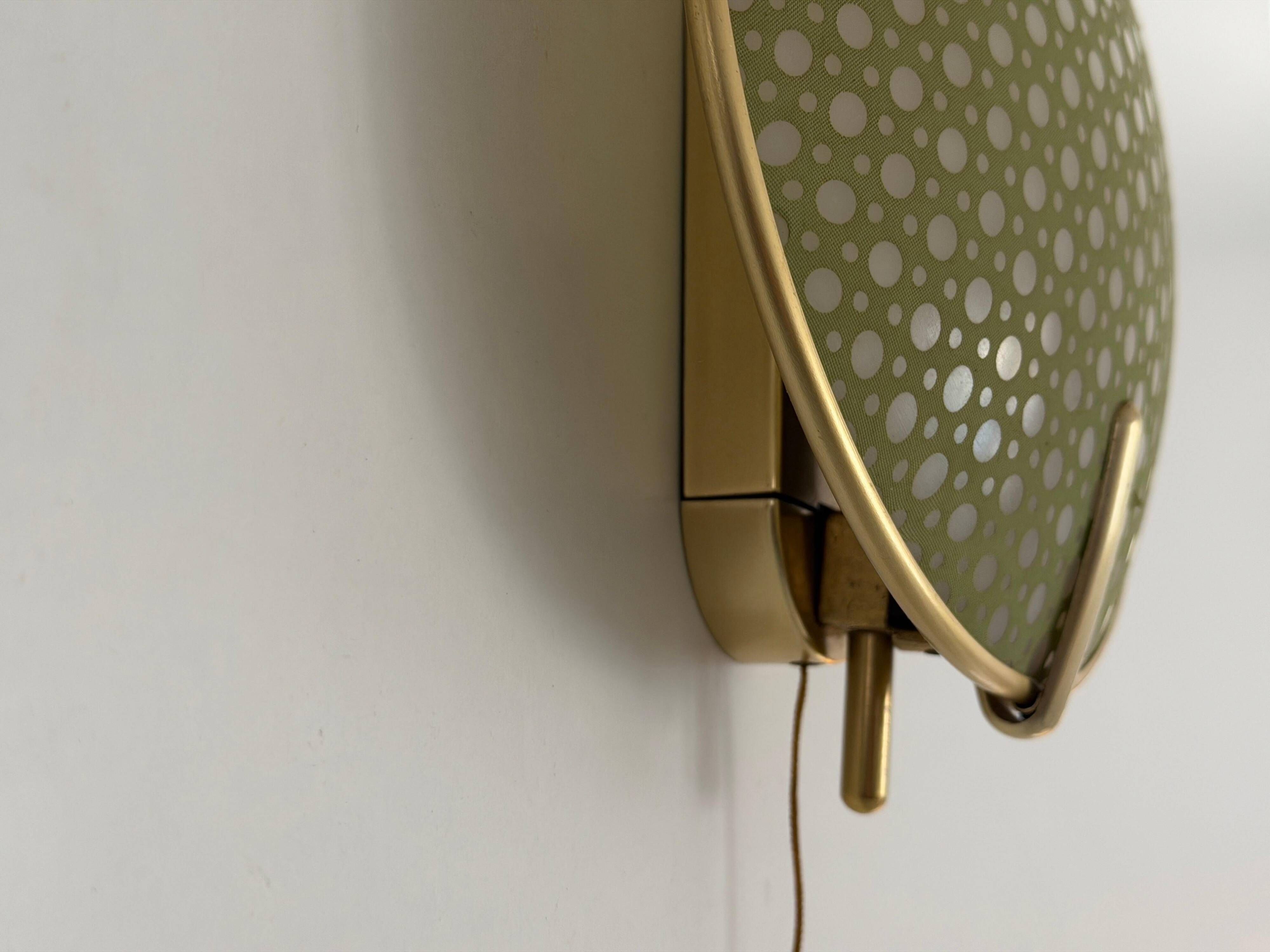 Pair of green plexiglass and gold metal wall lights by Erco, 1950s, Germany.