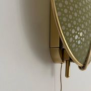 Pair of green plexiglass and gold metal wall lights by Erco, 1950s, Germany.