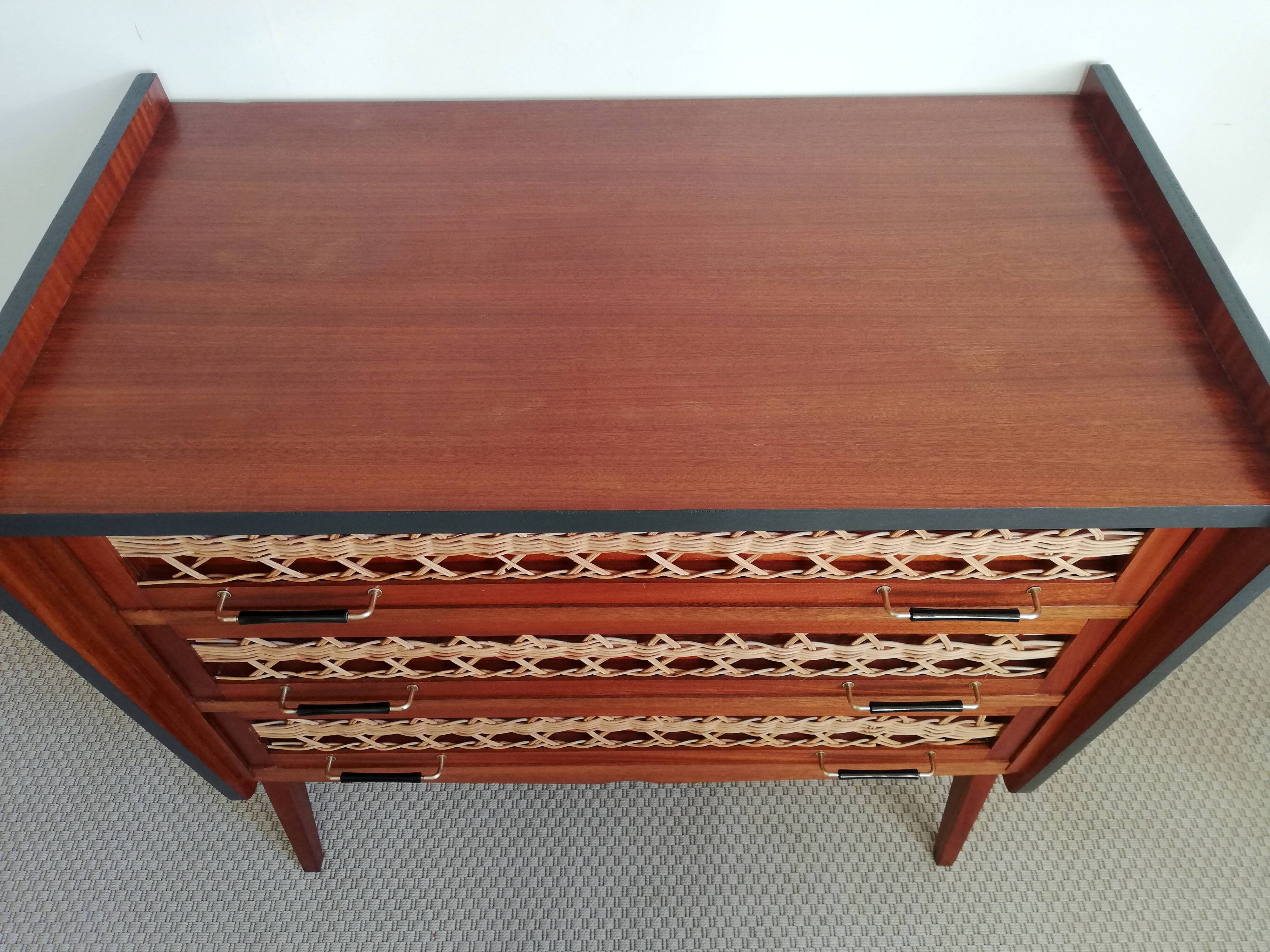 Teak and rattan chest of drawers feet compass