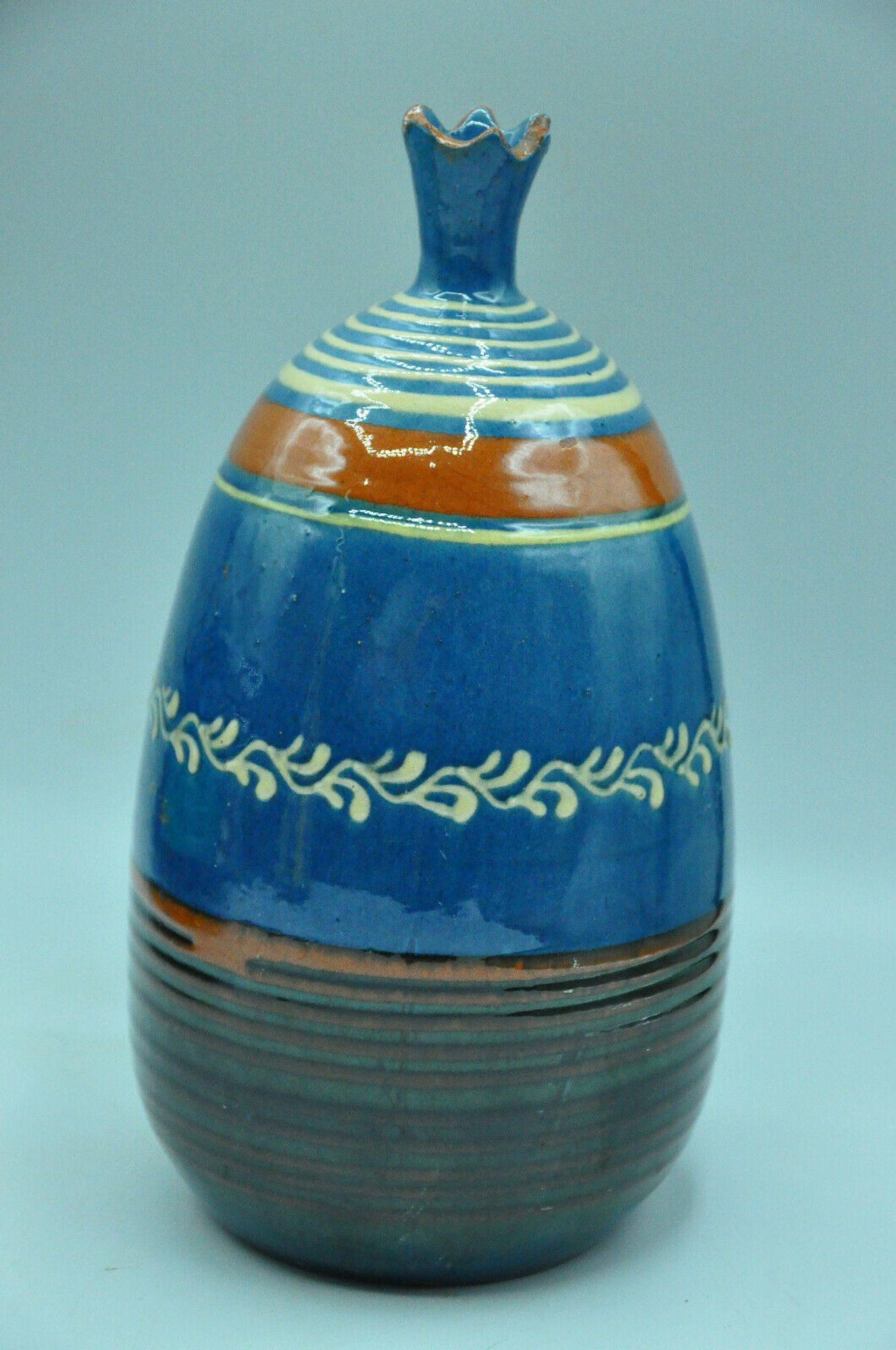 Signed terracotta vase to be identified