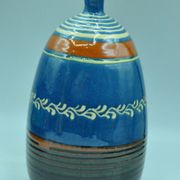 Signed terracotta vase to be identified