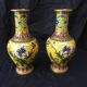 Pair of cloisonne enamel vases with japanese floral decor