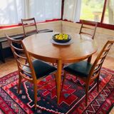 Expandable teak dining table, butterfly extension, circa 60s