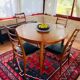 Expandable teak dining table, butterfly extension, circa 60s