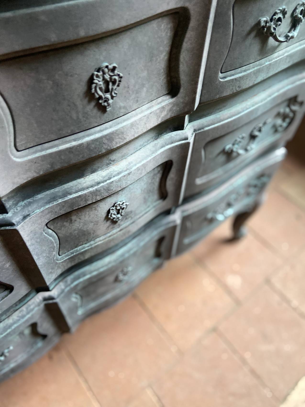 Antique Louis XV style commode, aged finish, practical elegance.