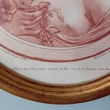 Engraving young girl in oval golden frame