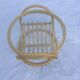 Round coffee table in glass and rattan