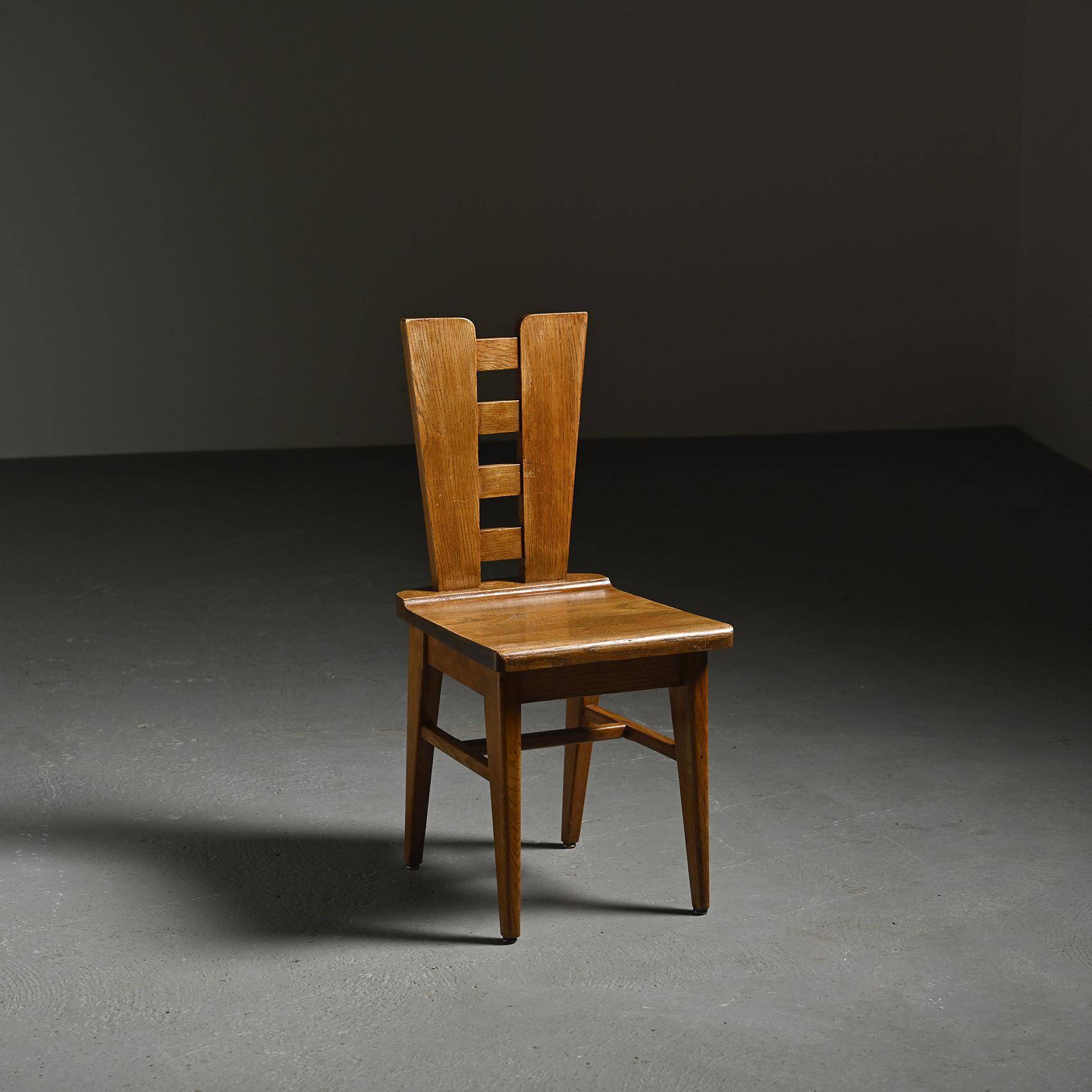Set of six oak chairs by Henry Jacques Le Même, France circa 1940