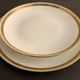 8 flat porcelain plates from Limoges Bernardaud, gilded Greek decoration, twentieth century