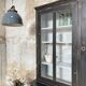 Display cabinet in patinated wood