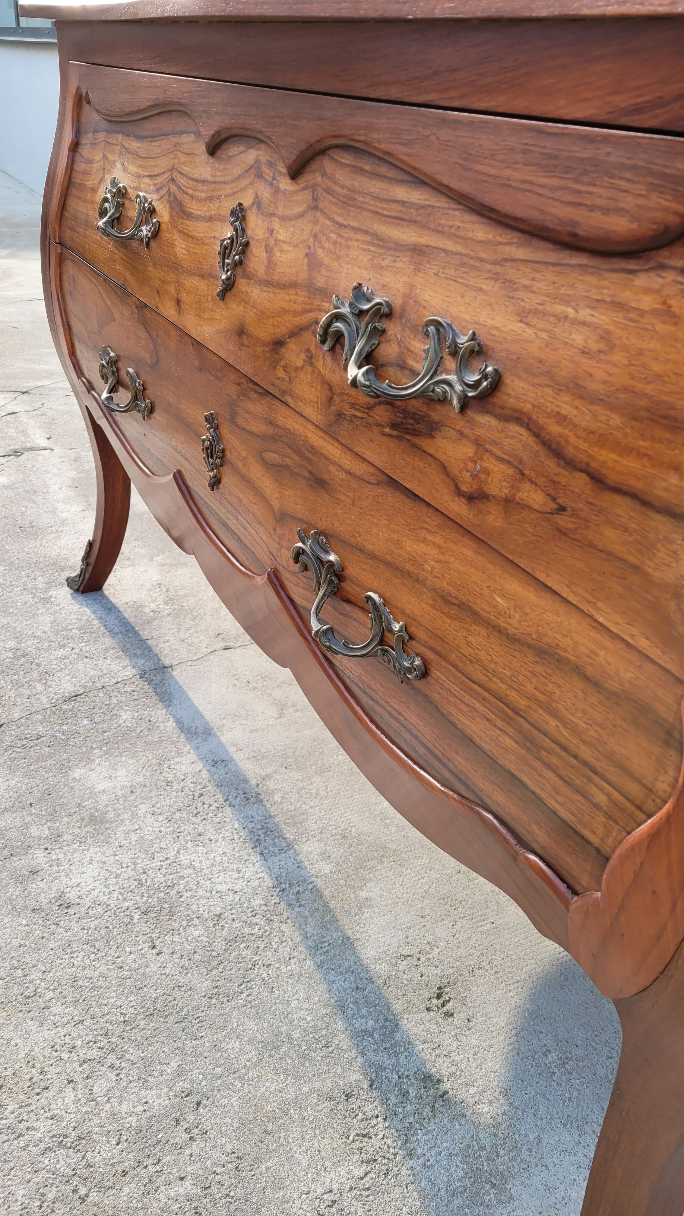 Curved Louis XV style commode in mahogany.