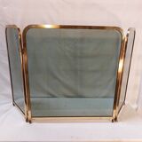 Vintage fireplace screen in smoked glass and gold-tone metal