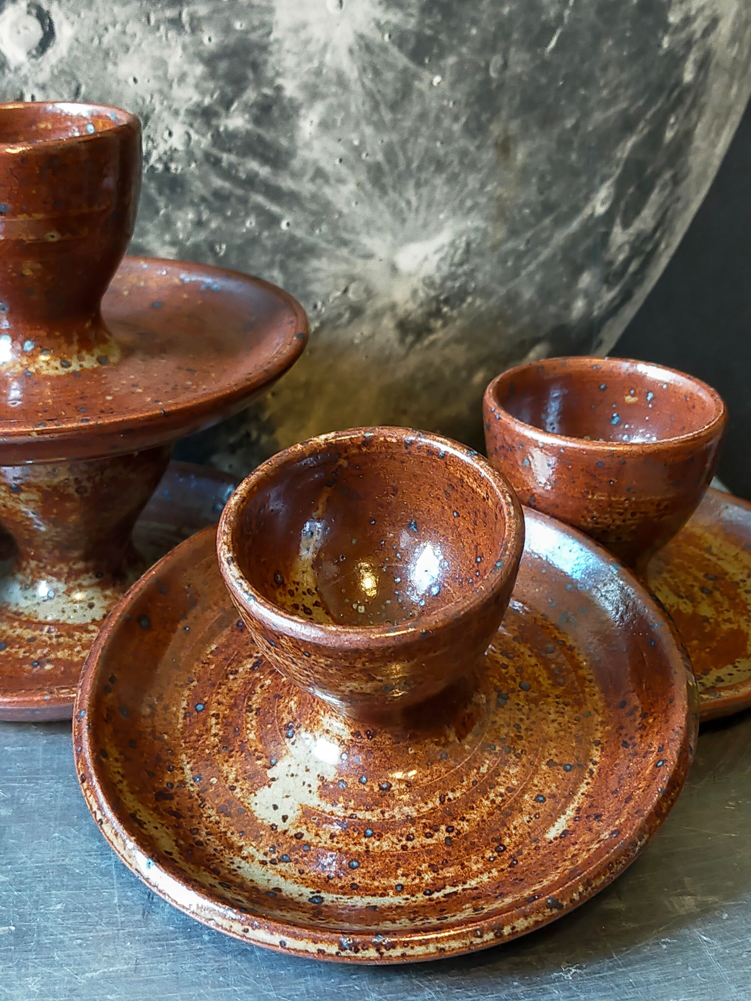 Four pyrite stoneware shells