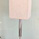 Silver floor lamp with a straight shade.