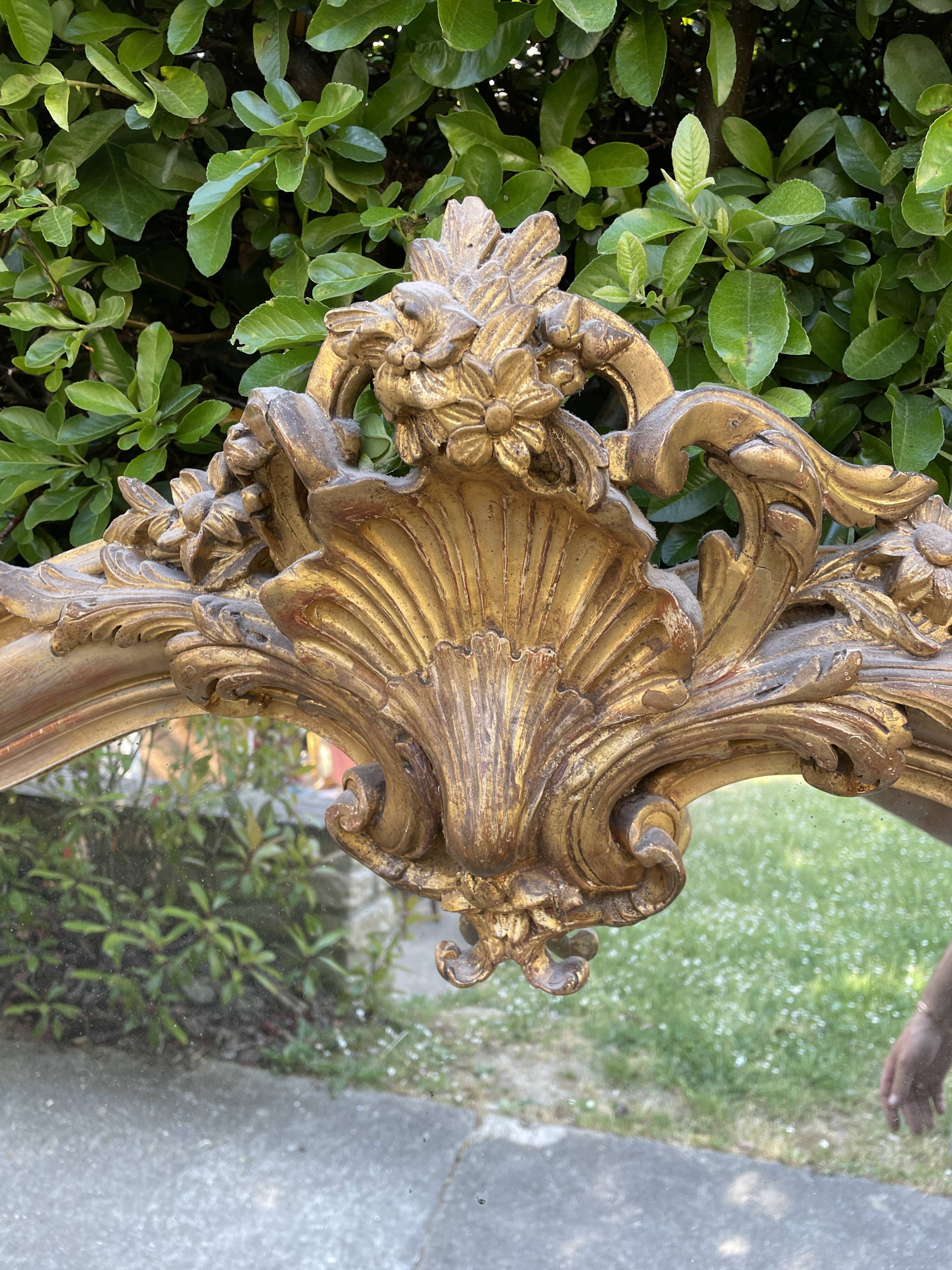 Old Louis XV style mirror in wood and gilded stucco. Napoleon III