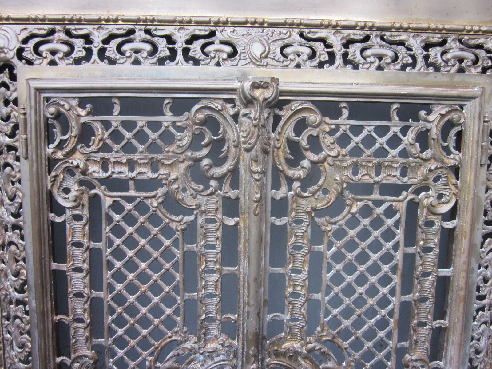 Front of the old fireplace all in bronze