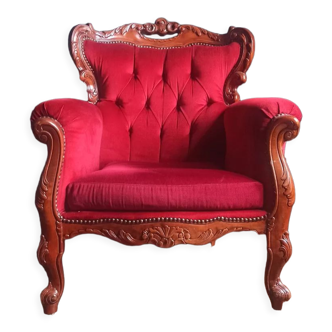 Fauteuil en bois sculpté style baroque en velour rouge bordeaux