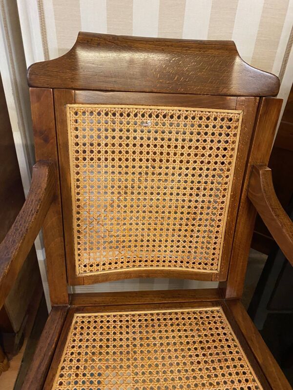 Fauteuil de barbier style Louis Philippe en hêtre assise et dossier en cannage