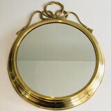 Miroir décoratif oval en laiton orné d'un important noeud torsadé