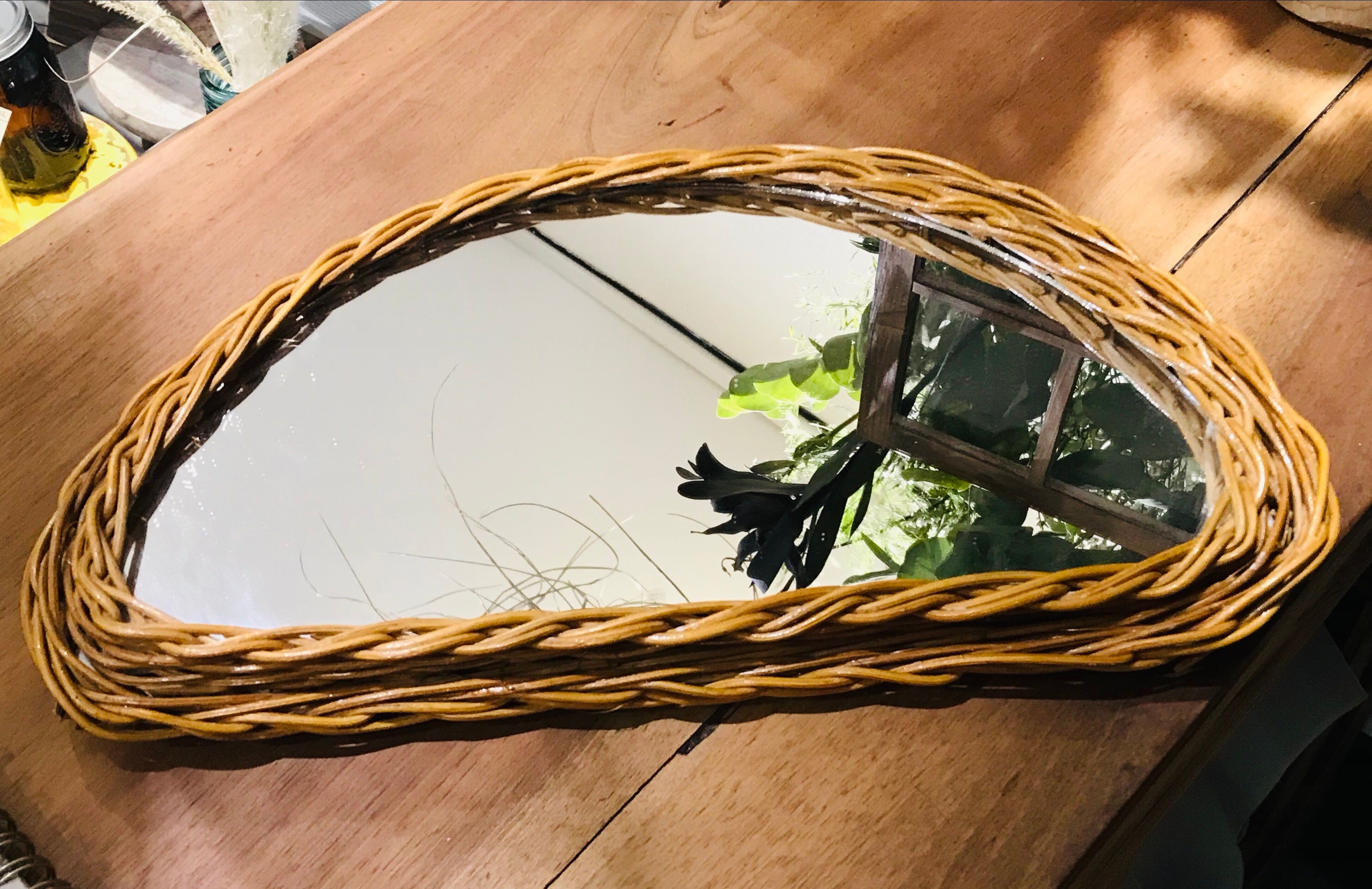 Vintage half moon rattan mirror