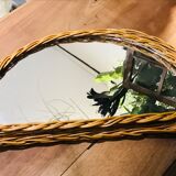 Vintage half moon rattan mirror