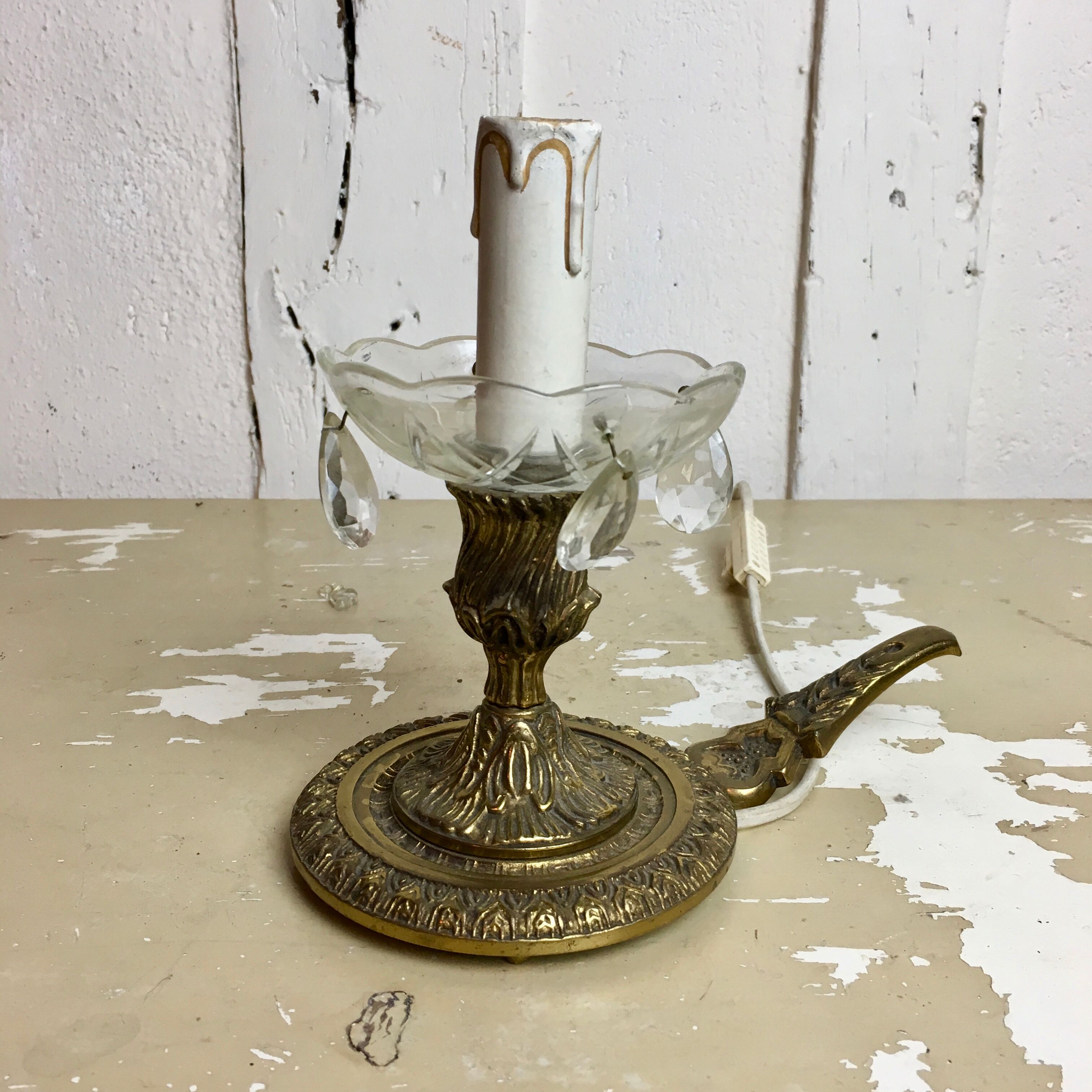 Ancient cave lamp in gilded bronze
