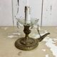 Ancient cave lamp in gilded bronze