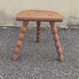 Turned wooden tripod stool