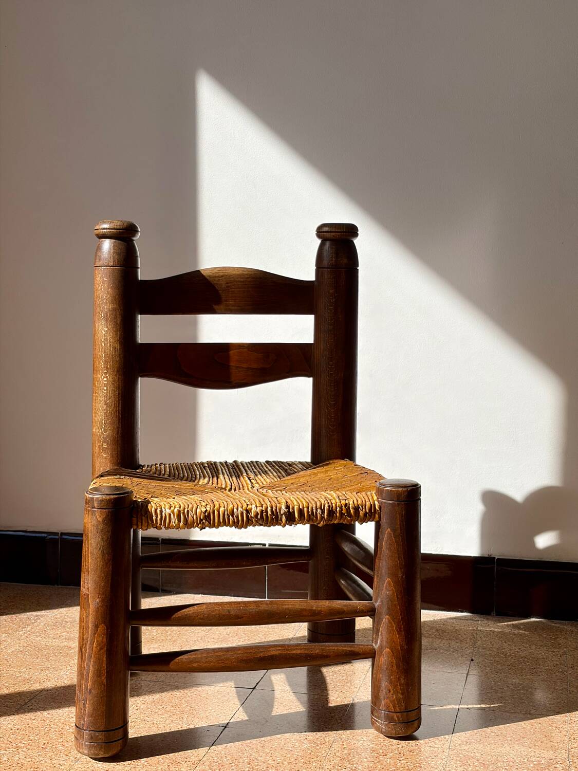 Low fireplace chair attributed to Charles Dudouyt.