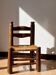 Low fireplace chair attributed to Charles Dudouyt.