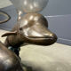 Bronze dolphin coffee table signed C Caudion, 1960s