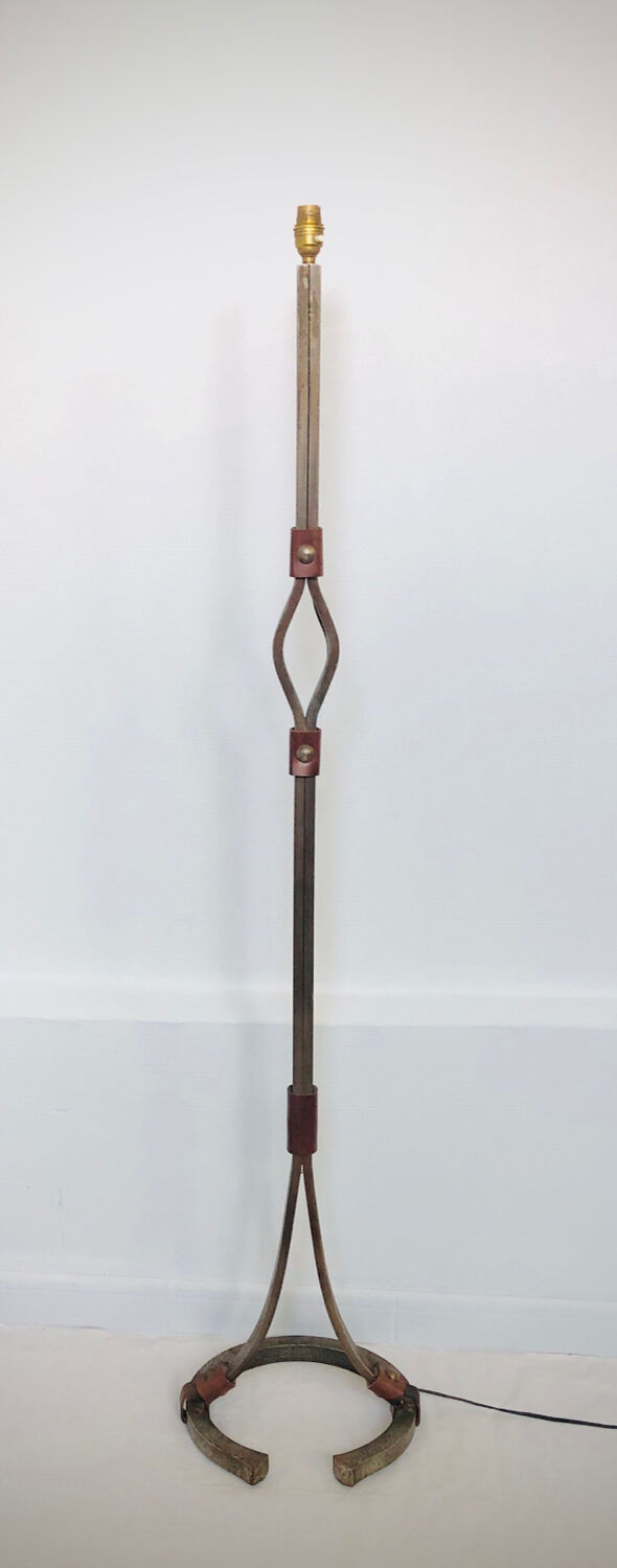 Hammered wrought iron and leather floor lamp by Jean Pierre Rickaert, 1950s