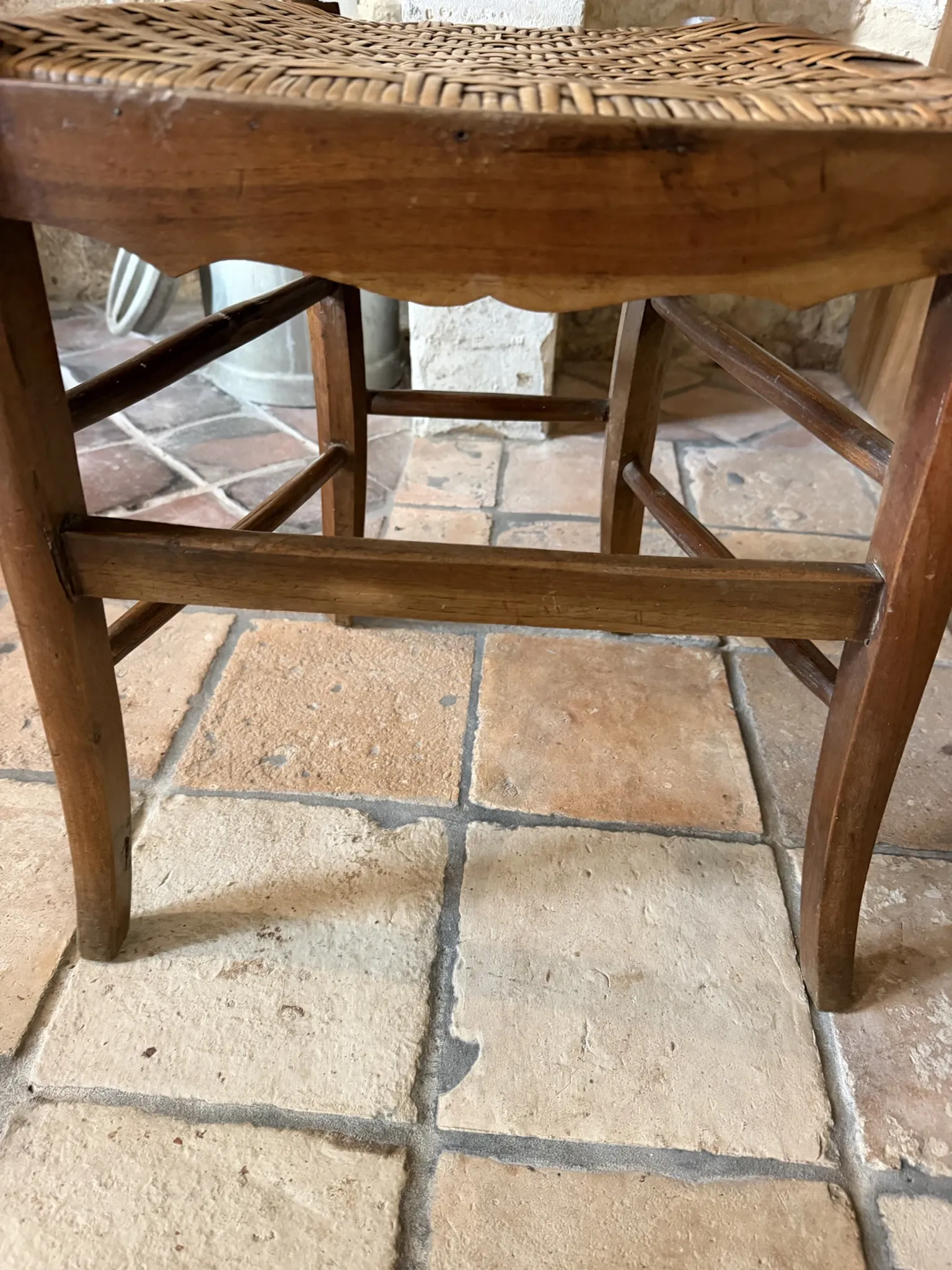 Campaign stool in rattan and wood