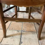 Campaign stool in rattan and wood