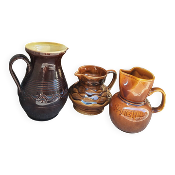 Vintage glazed ceramic pitcher trio