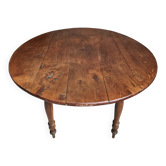 Antique French oak drop-leaf table, round dining table, circa 1880–1920.