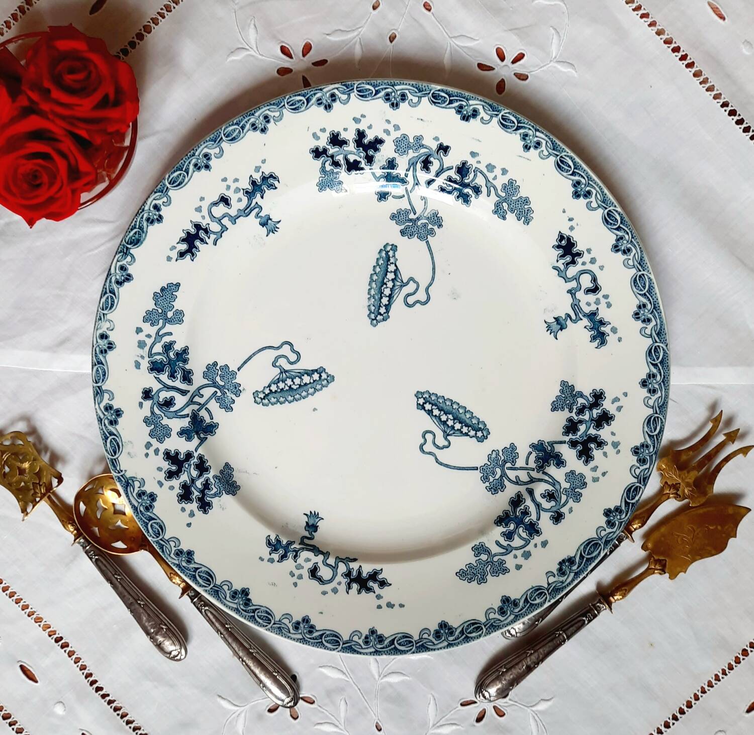 Old mismatched iron earthenware dessert plates accompanied by a dish