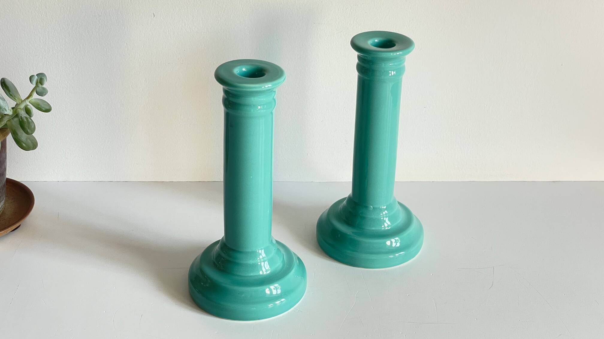 Pair of vintage ocean blue ceramic candlesticks